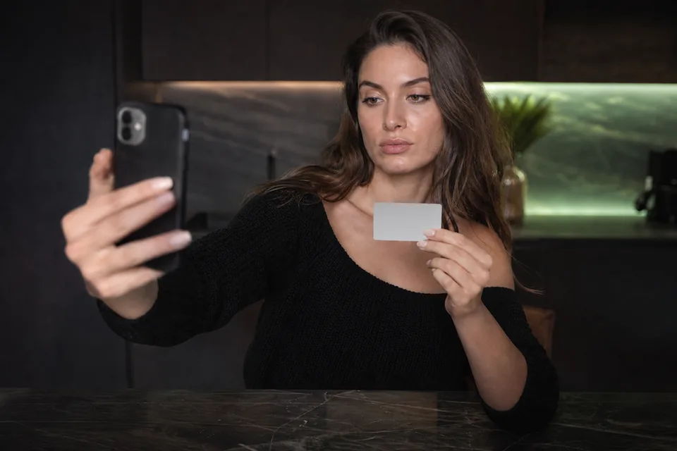 Creator completing a live identity check on her phone